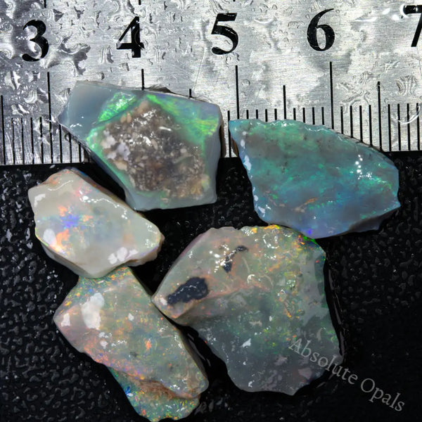 Opal Small Rough/Offcuts 14.1Cts (2.8gms) Lightning Ridge dark base Opal Small Rough/Offcuts 14.1Cts (2.8gms) Lightning Ridge dark base