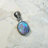 Lightning Ridge solid opal pendant in sterling silver, showcasing vibrant green and blue hues.