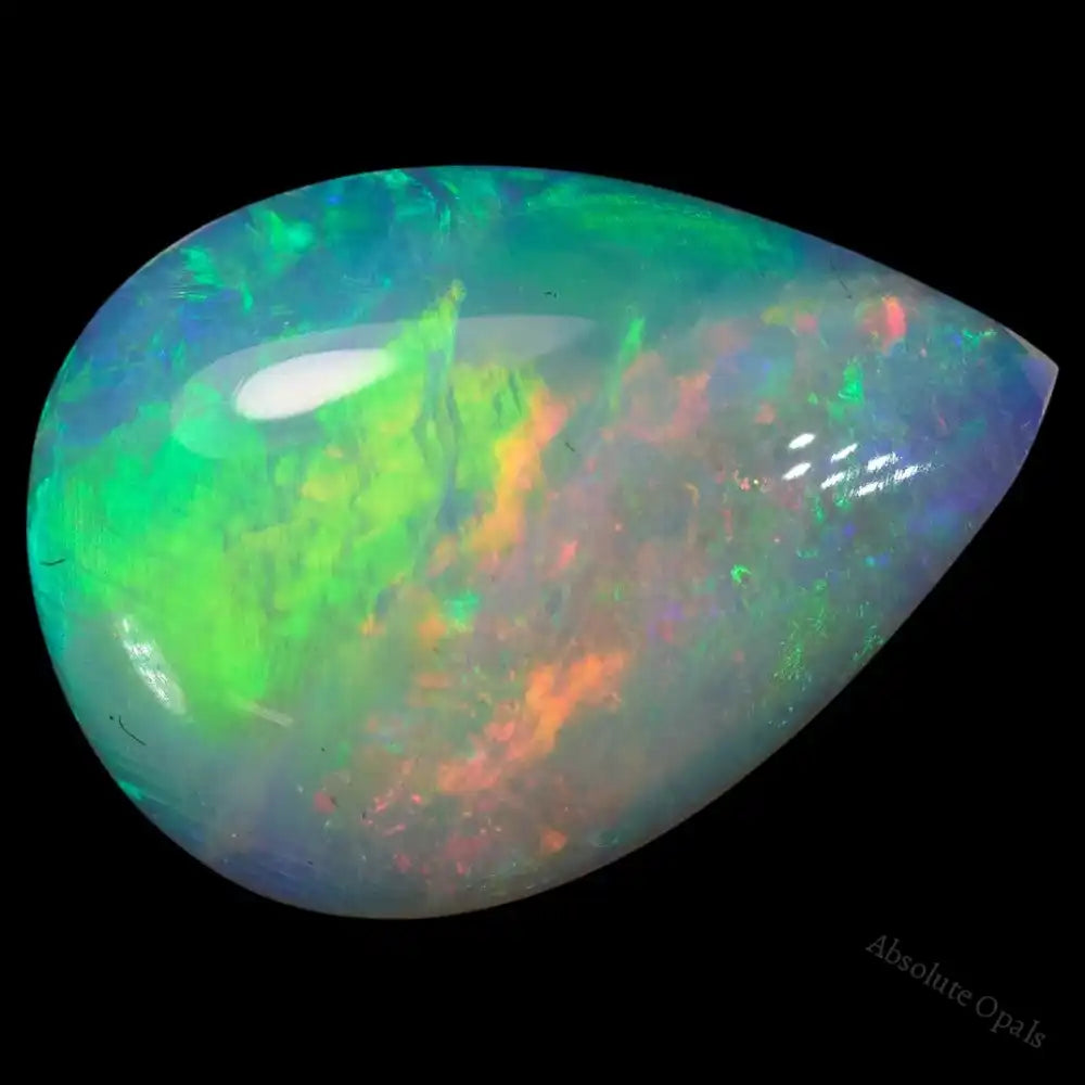 0.88 cts South Australian opal crystal with vibrant orange, yellow, and green colors in teardrop cut.