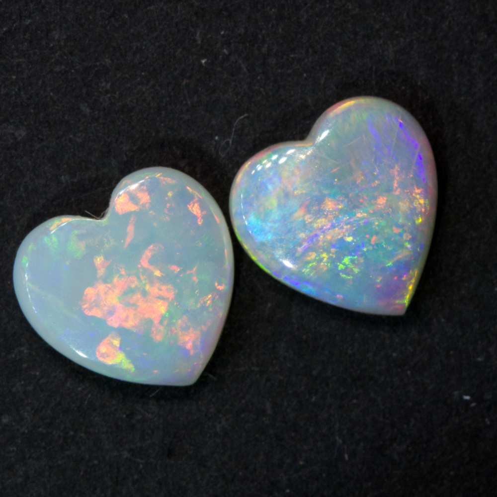 Light opal cabochon pair