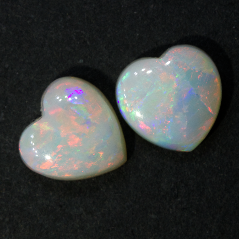 Light opal cabochon pair