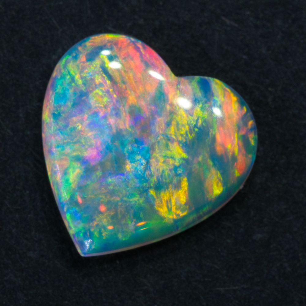 Cut solid light opal stone