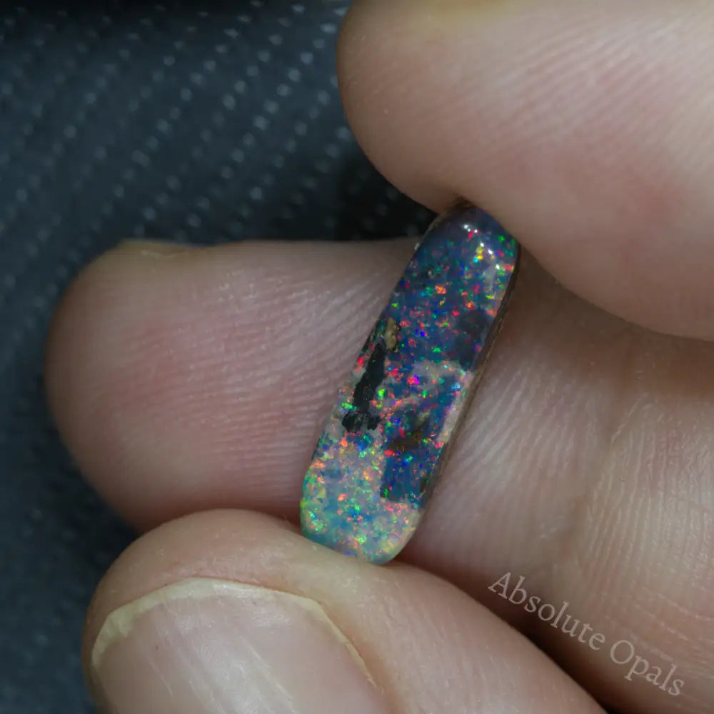 red boulder opal stone