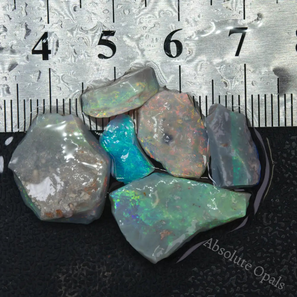 20.25tcw Lightning Ridge CP Australian Opal Rough/rubs Crystal Color 20.25tcw Lightning Ridge CP Australian Opal Rough/rubs Crystal Color