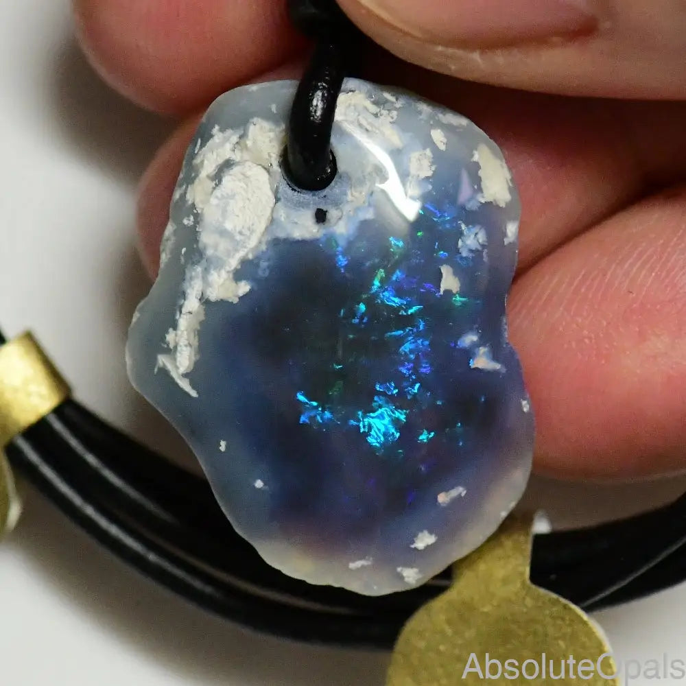 23.65 cts Australian Opal Drilled Greek Leather Mounted Pendant