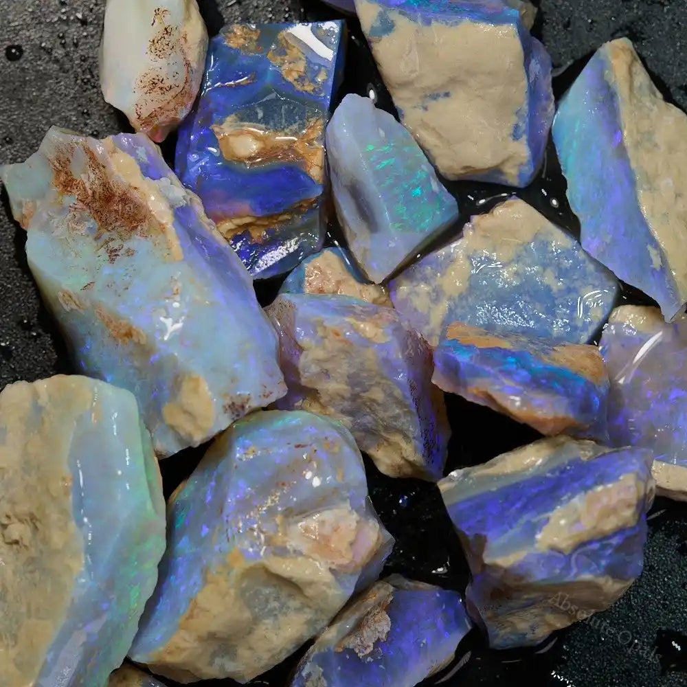 Rough Lightning Ridge opal stone for carving with vibrant green-blue play of color