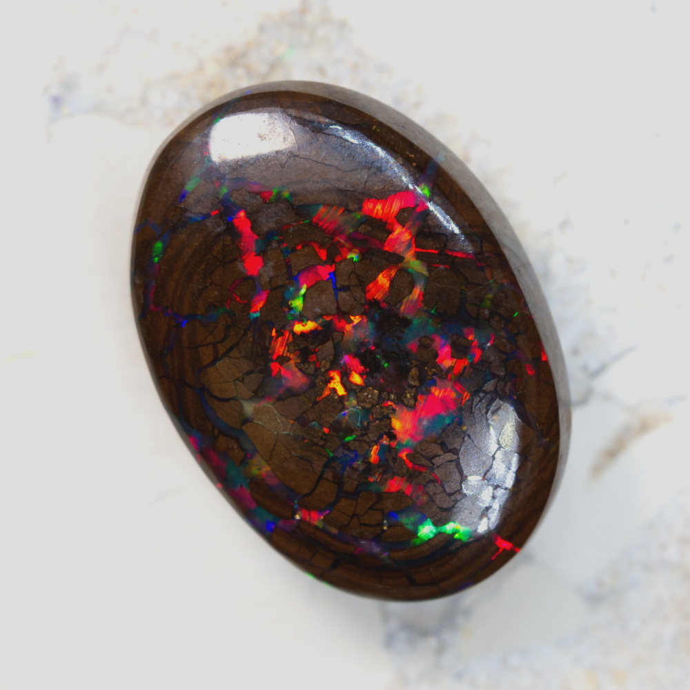 Red boulder opal