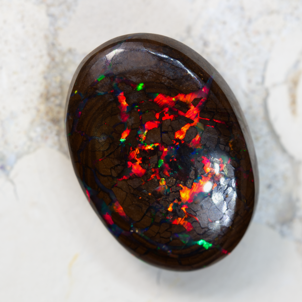 Red boulder opal