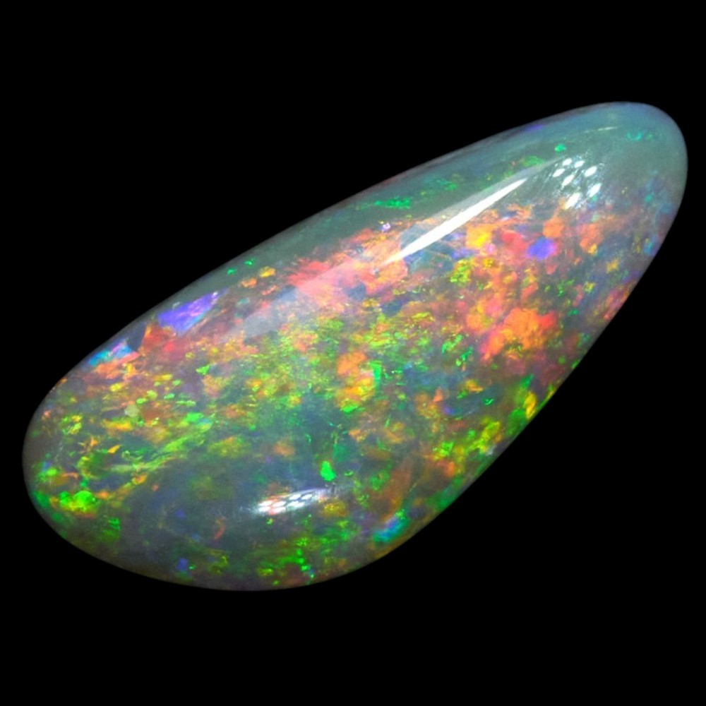 1.00 cts Dark Opal Lightning Ridge solid stone featuring vibrant multicolored hues in a triangular shape.