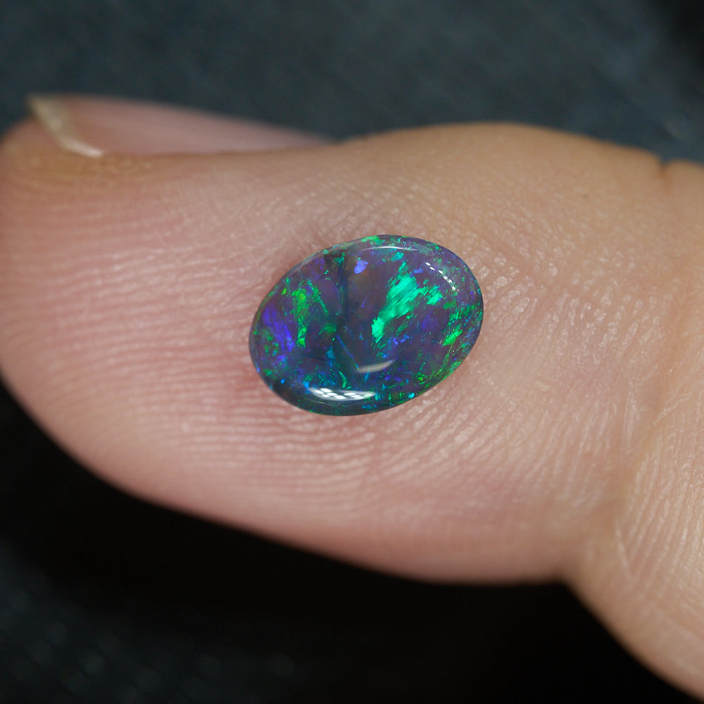 0.59 cts Black Opal cut, not set (Lightning Ridge)