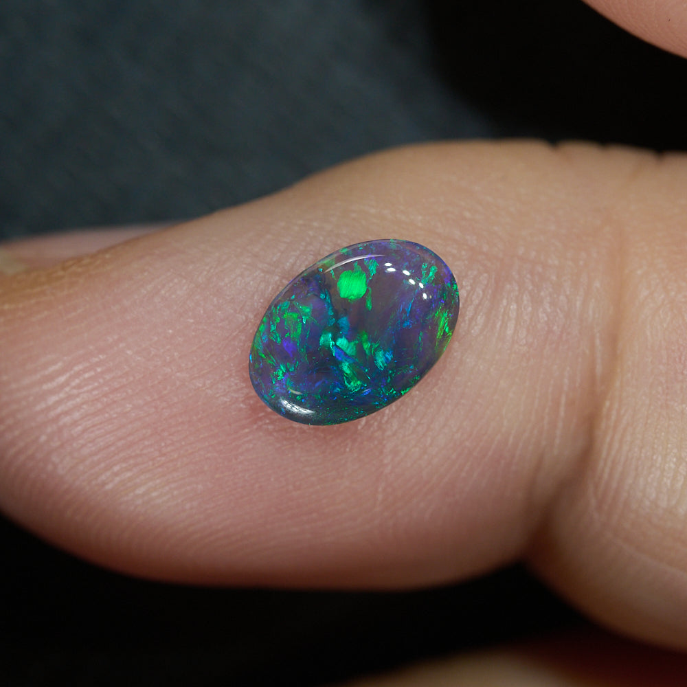 0.59 cts Black Opal cut, not set (Lightning Ridge)