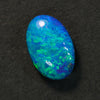 0.83 cts Australian Doublet Opal stone from Lightning Ridge, vibrant green and blue oval gemstone.
