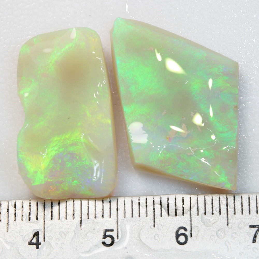 23.05 cts rough opal parcel from Lightning Ridge, showcasing green hues and natural solid opal gemstones.