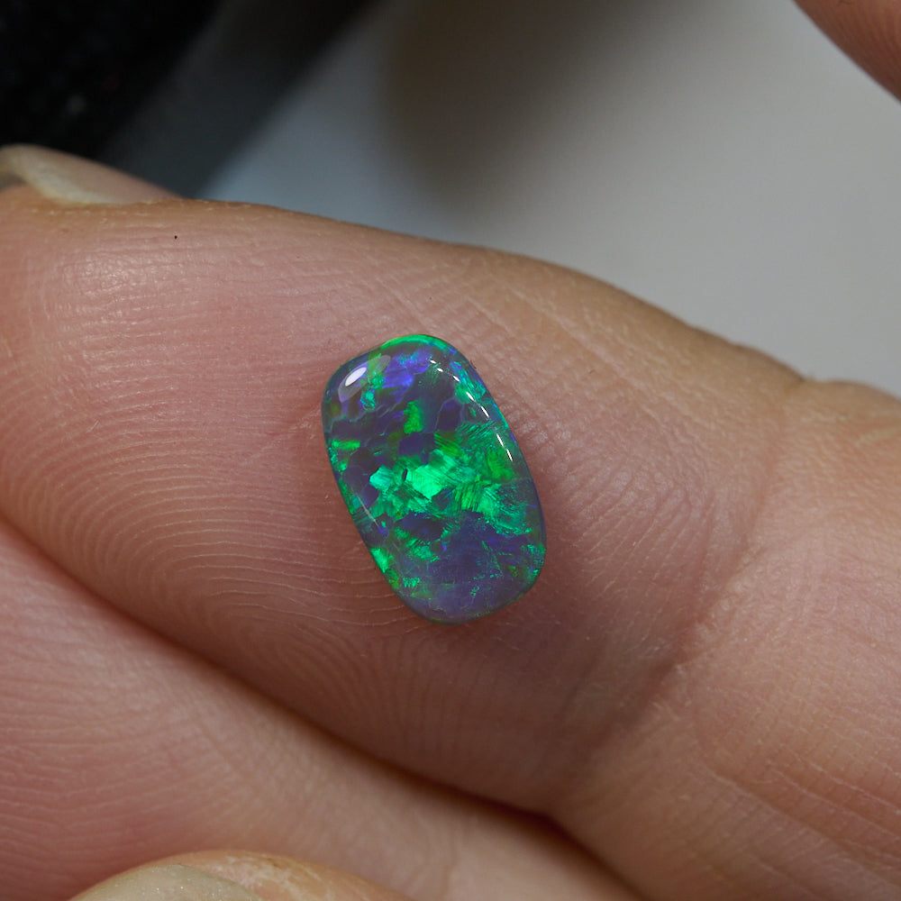 0.81 cts Black Opal cut, not set (Lightning Ridge)
