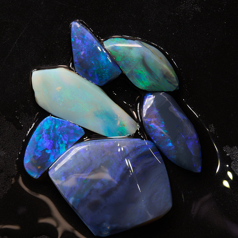 Natural Lightning Ridge opal rubs parcel rough opal with visible colour for cutting