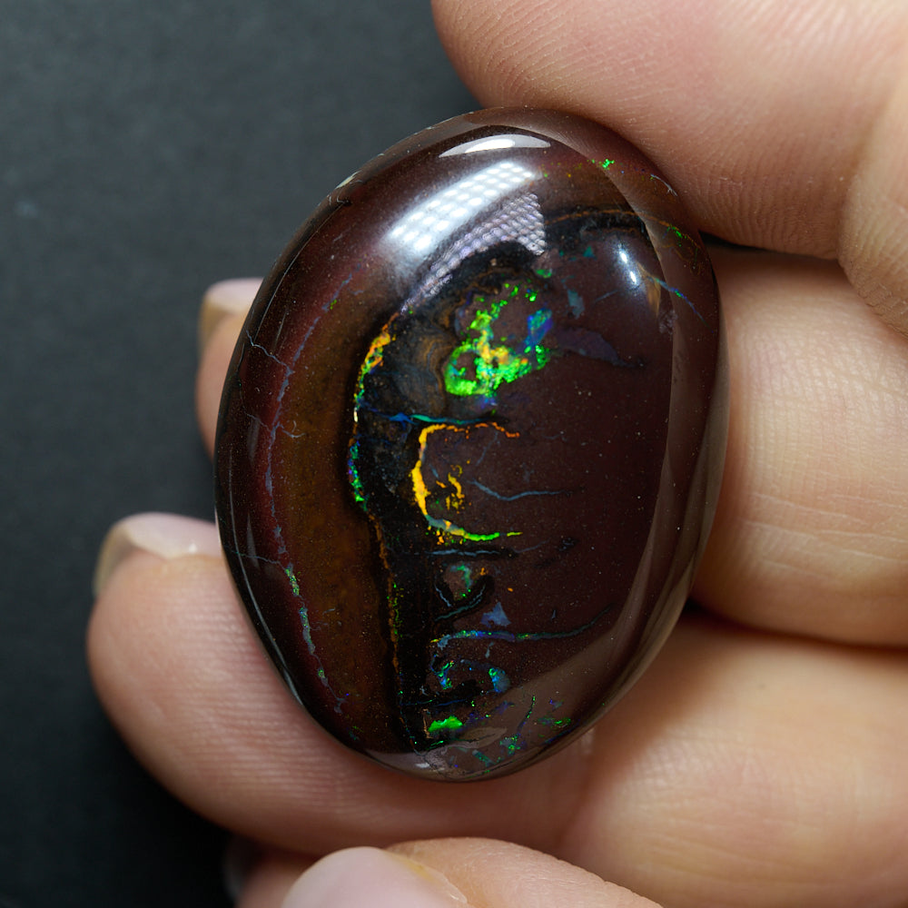 74.3 cts Boulder Opal Cut Stone