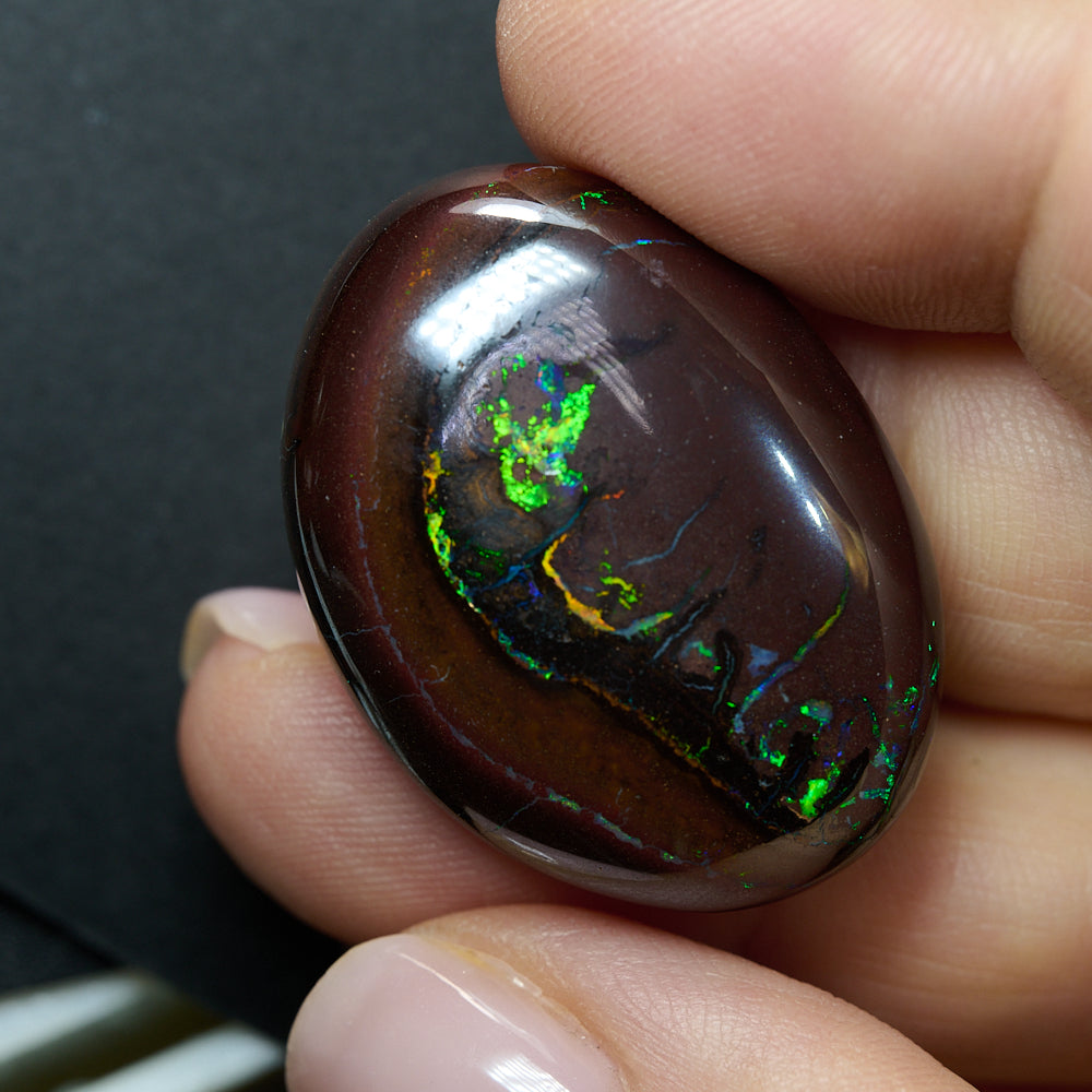 74.3 cts Boulder Opal Cut Stone