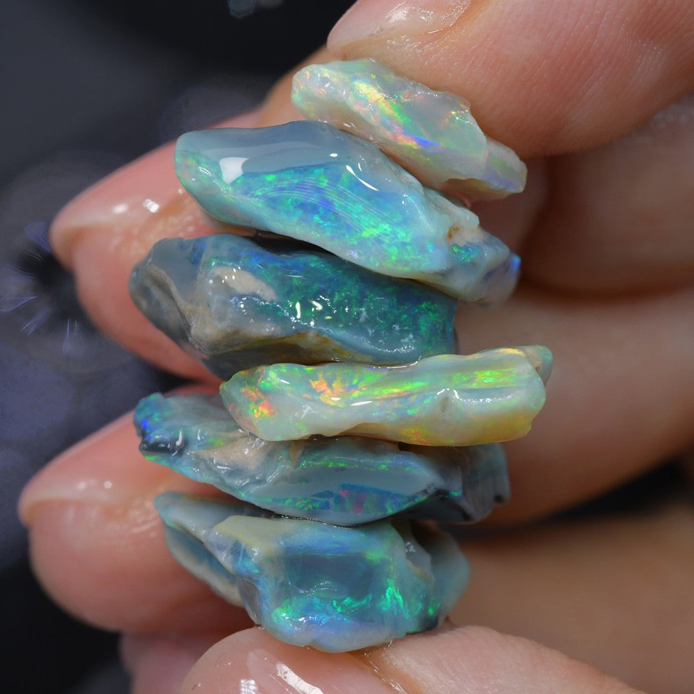 Rough Opal Parcel Lightning Ridge – natural Australian black opal rough with strong color potential, ideal for investment, cutting, and collectors