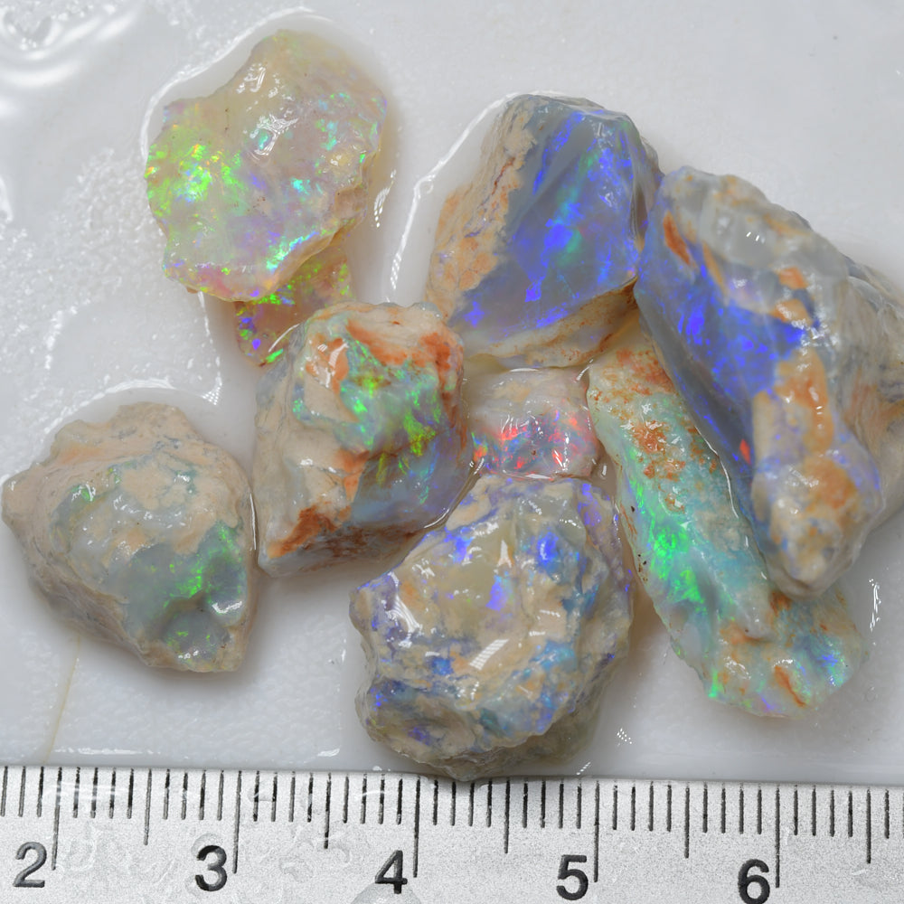 Mining rough opal parcel from Lightning Ridge field