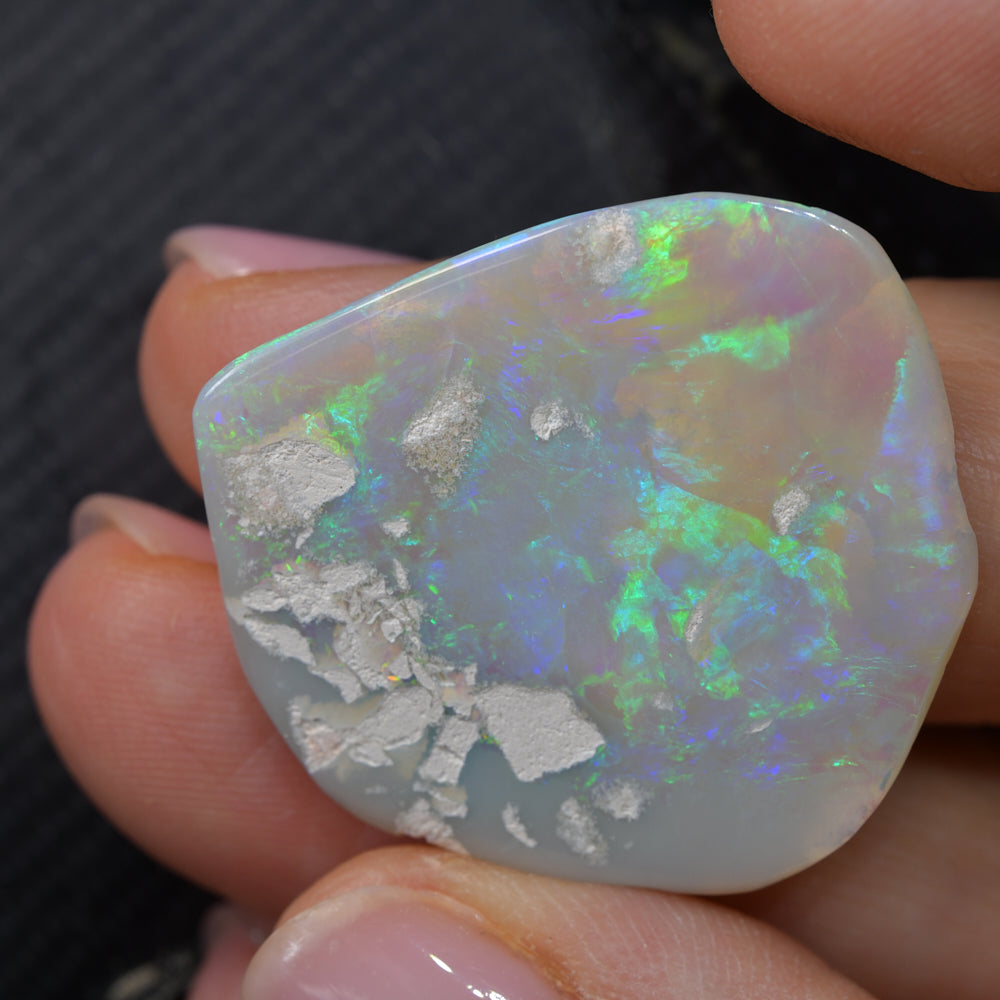 Australian Lightning Ridge green opal rough specimen featuring bright green colour play, natural opal formation, and collectible display appeal