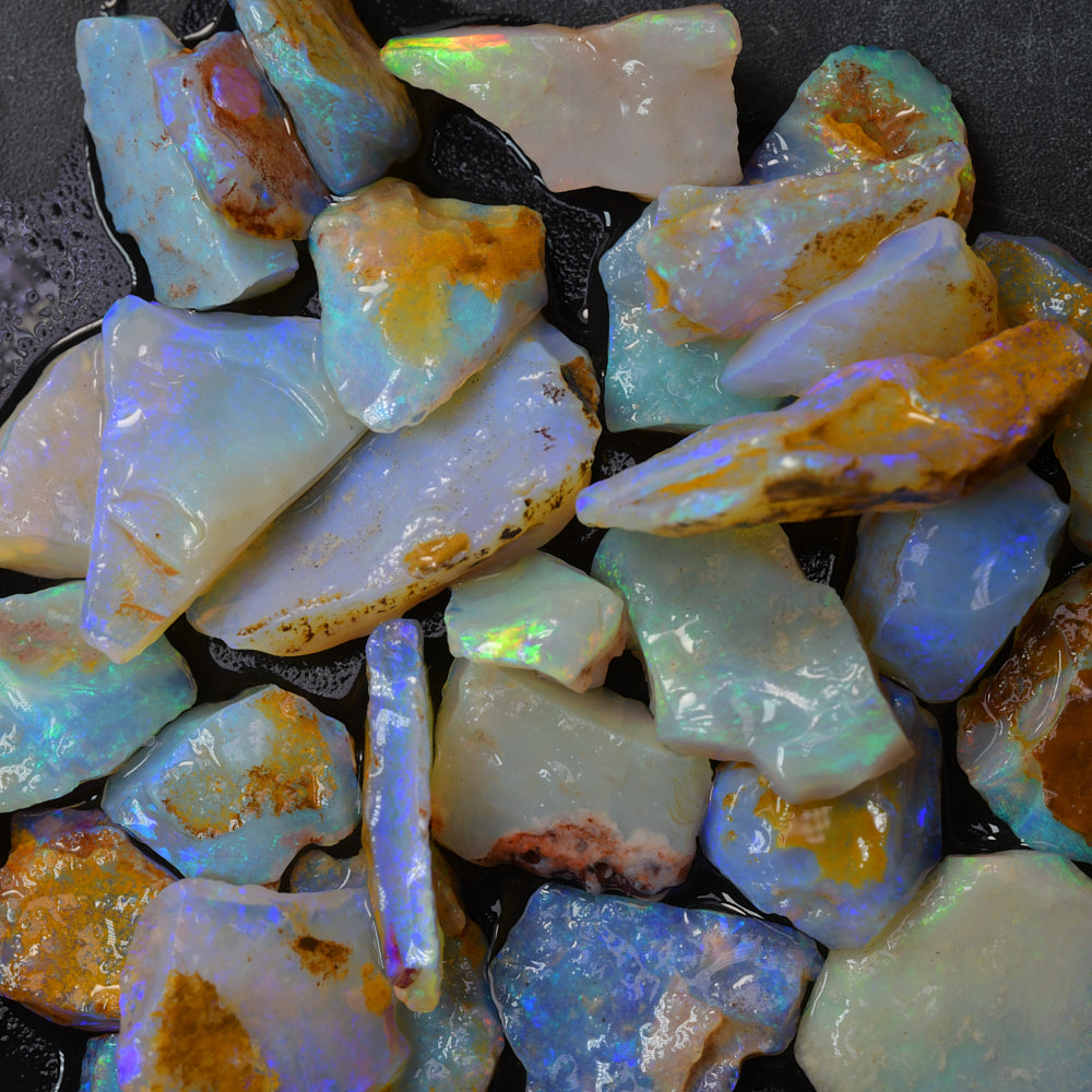 Rough seam opal parcel from South Australia containing natural opal rough from an opal seam with colour potential and unique patterns