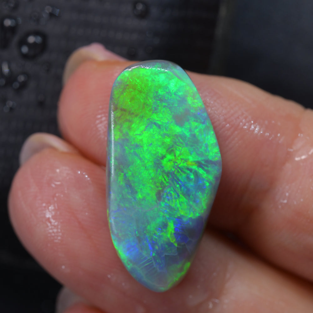 Lightning Ridge rough opal rub with bright green colour play
