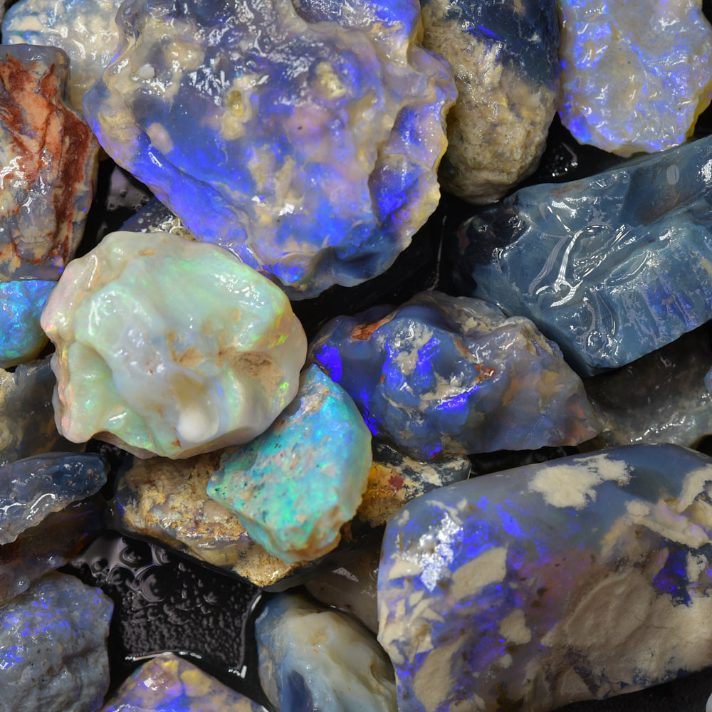 Lightning Ridge nobby rough opal parcel from Australia containing natural nobby opal with colour potential and unique natural formations