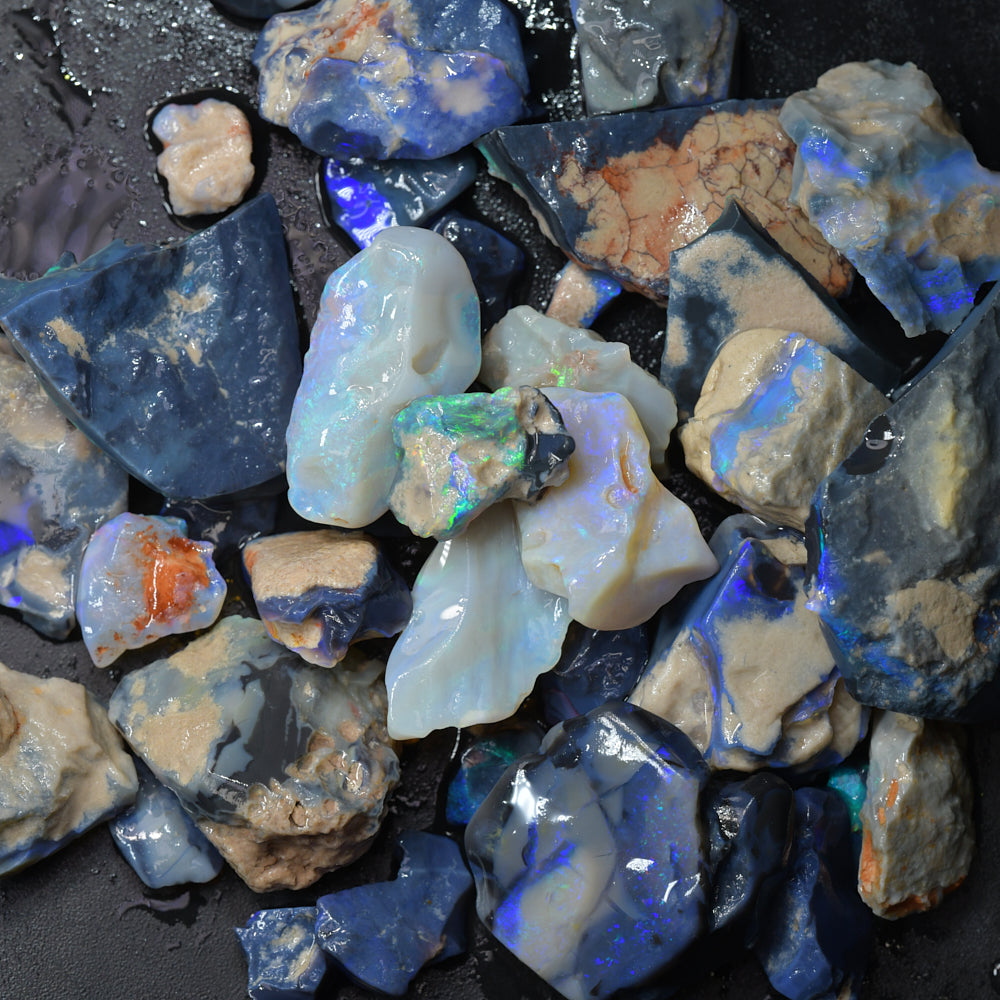 251.2 cts251.2 cts Rough Black Opal Parcel Lightning Ridge - Potch and Colour  CMR