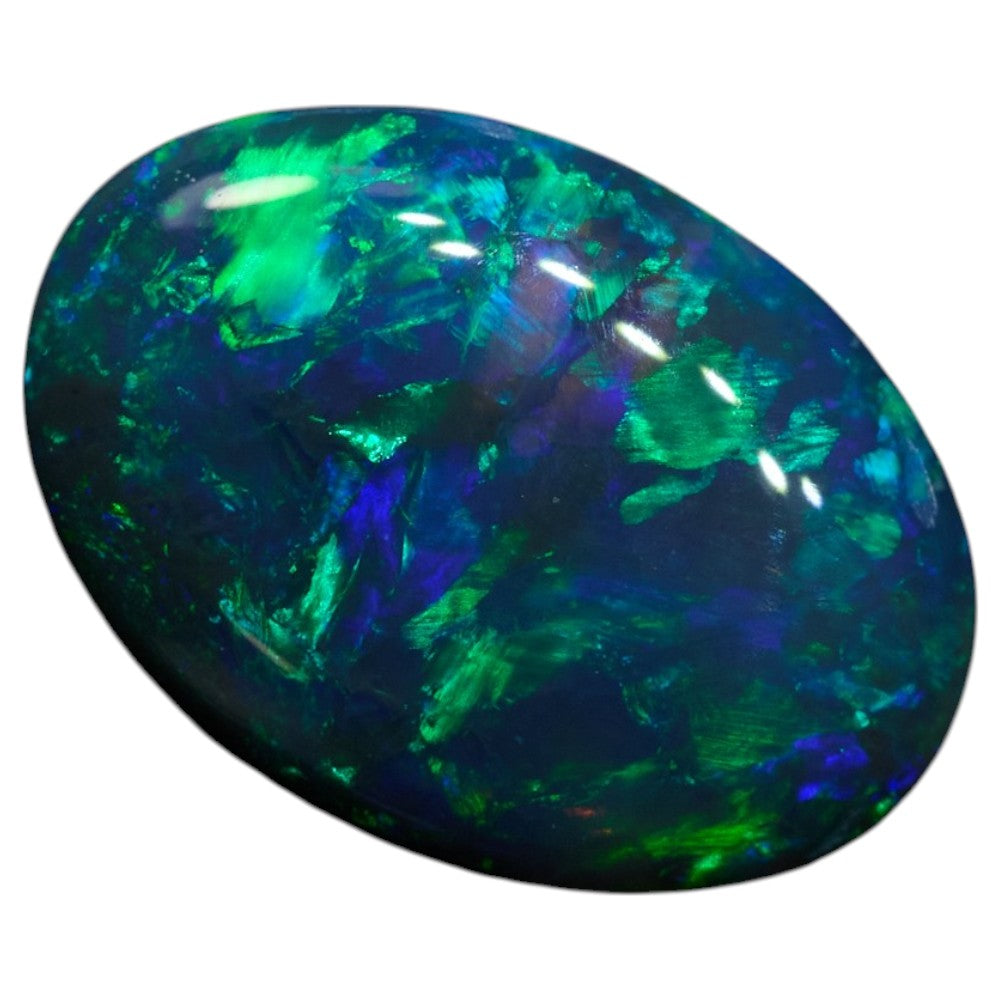 0.59 cts Black Opal Lightning Ridge Solid Cut Stone with vibrant green and blue hues, oval shape and low dome.
