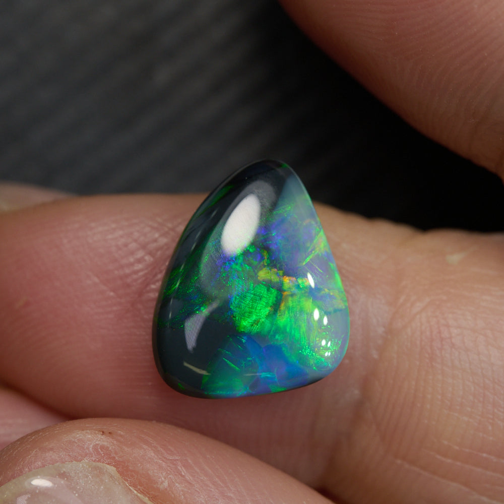 2.90 cts Black Opal cut, not set (Lightning Ridge)