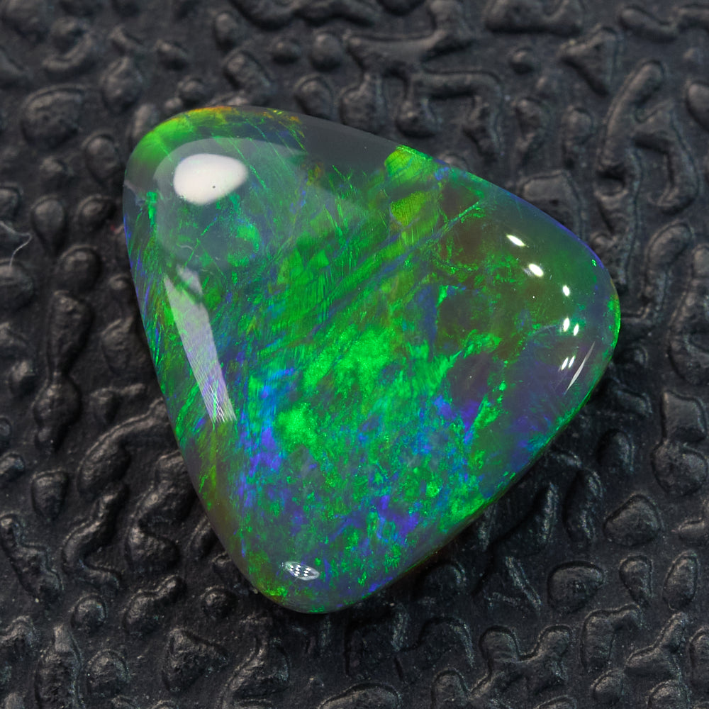 0.84 cts Black Opal cut, not set (Lightning Ridge)