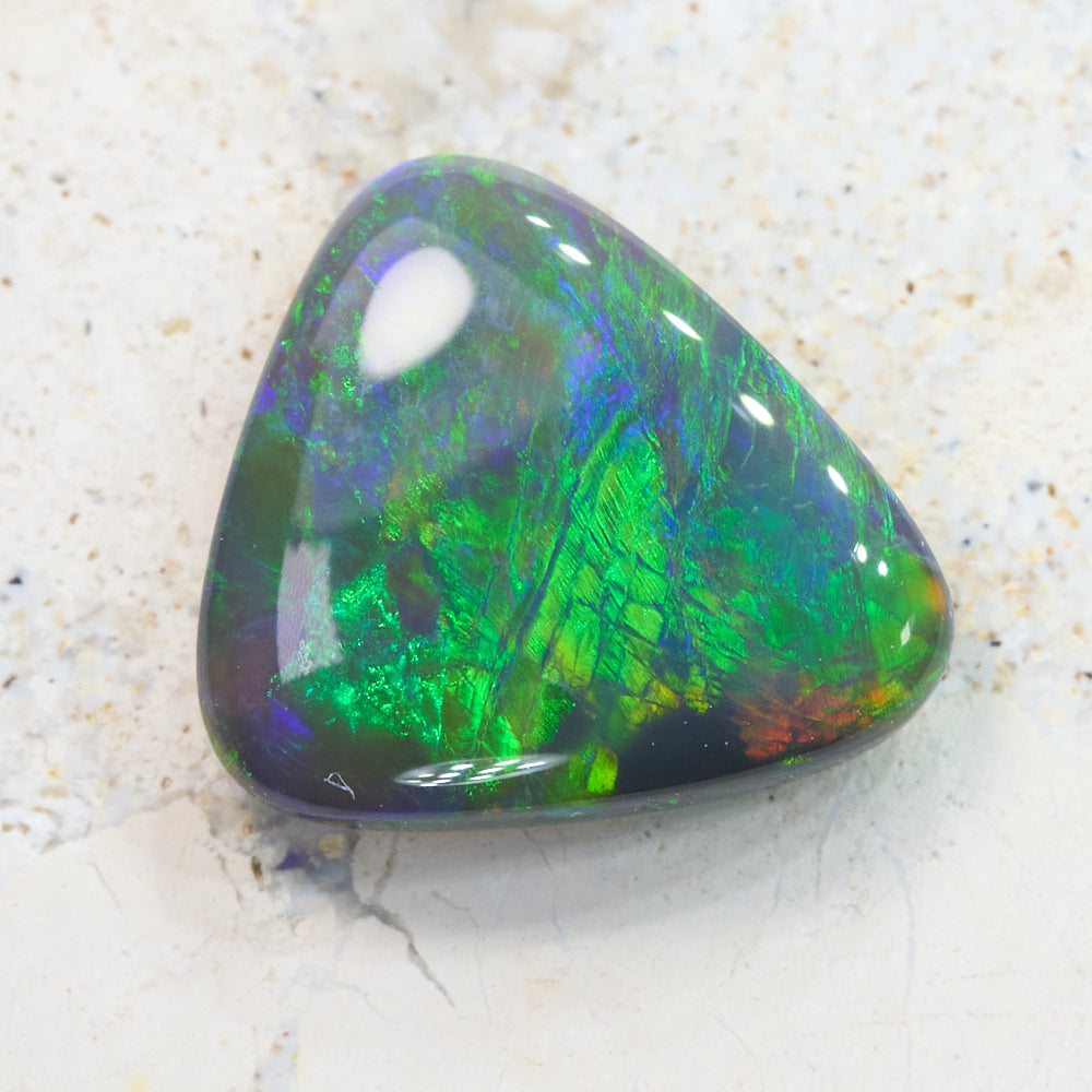 0.84 cts Black Opal cut, not set (Lightning Ridge)