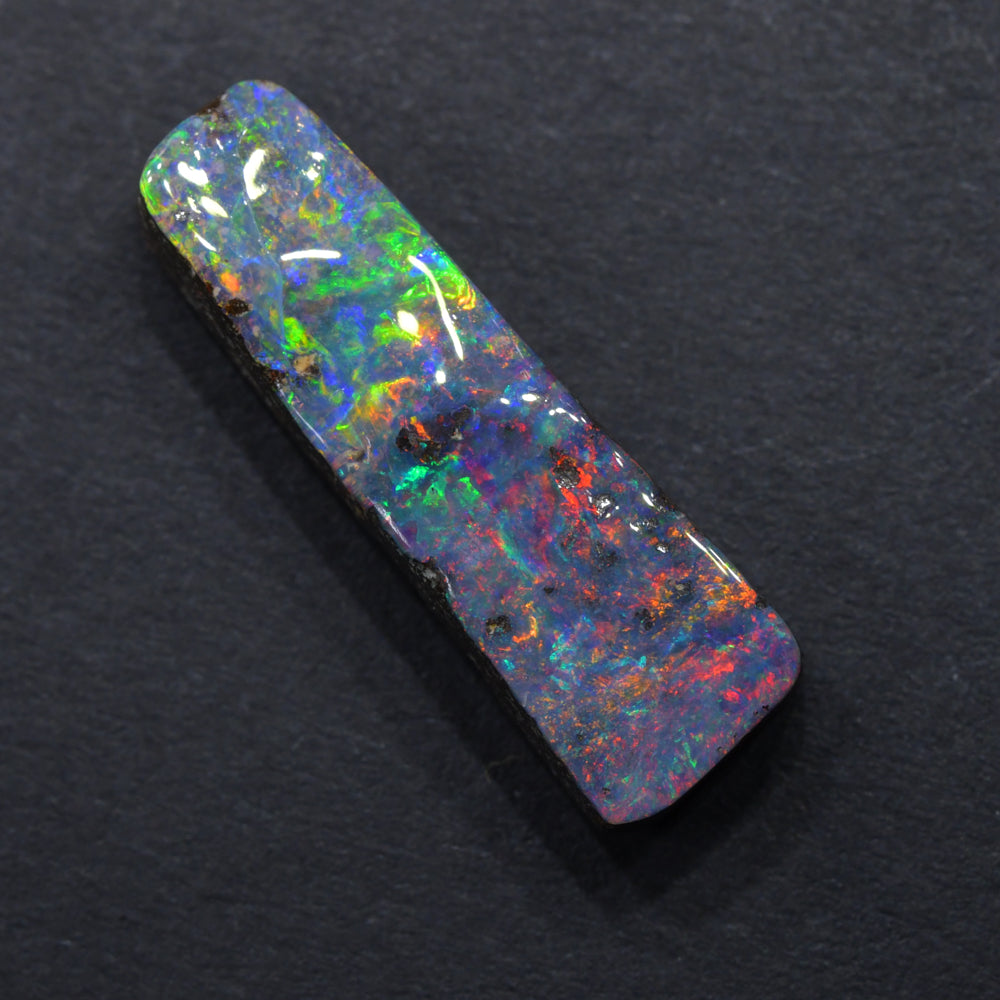 Natural boulder opal cabochon cut stone