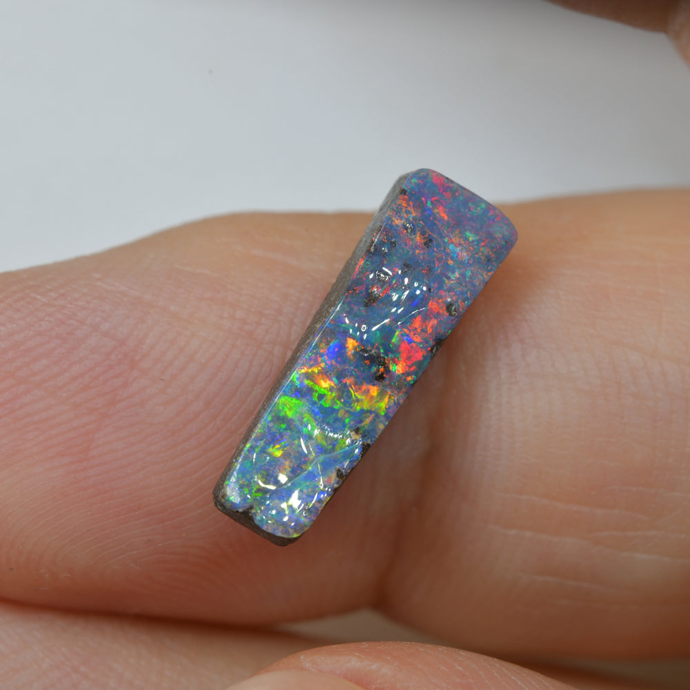 Bright multicolor boulder opal gemstone Australia