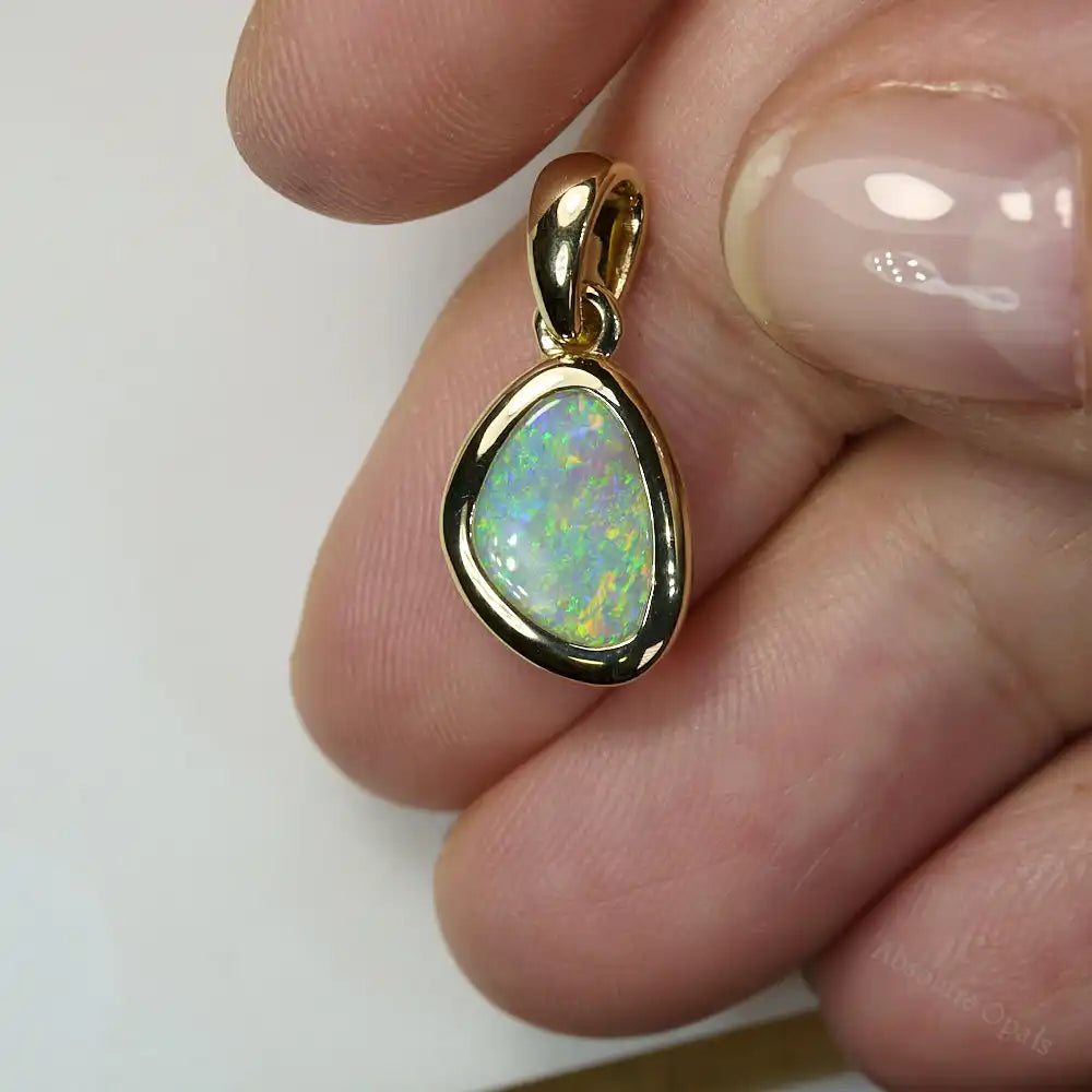 Full view of 14K gold pendant featuring a natural South Australian opal – elegant and unique handmade jewelry.