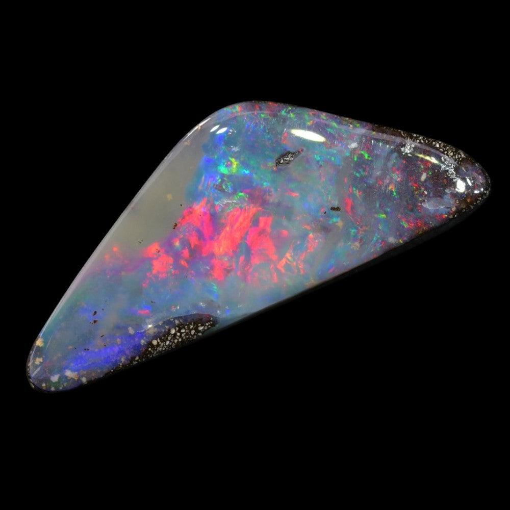 Australian boulder opal cut stone featuring vibrant natural colour flashes in ironstone, suitable for jewelry making, collecting, and gemstone enthusiasts