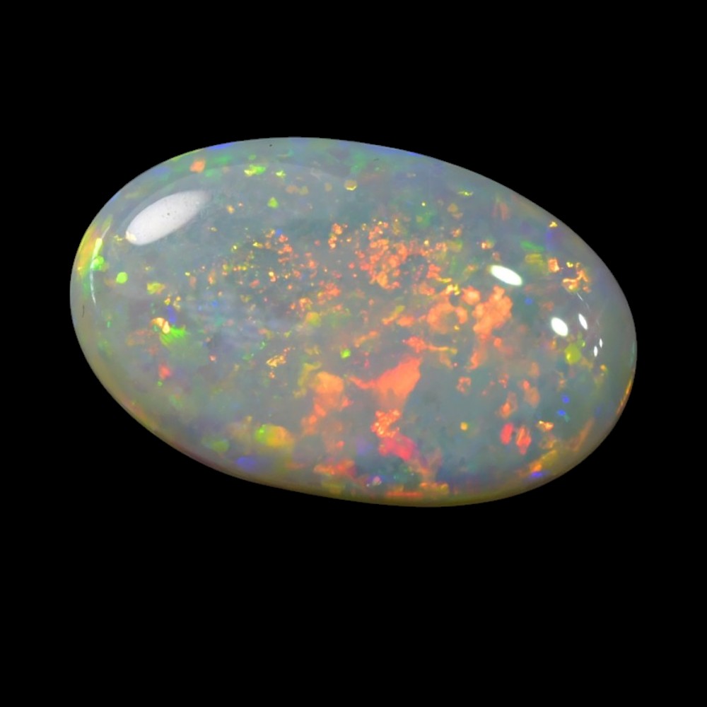 Light solid opal stone from Lightning Ridge, Australia, displaying natural colour play and polished gemstone quality