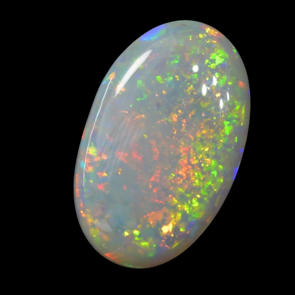 Light solid opal stone from Lightning Ridge, Australia, displaying natural colour play and polished gemstone quality